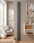 Children's room with a growth chart, shelf with toys, and wall art.